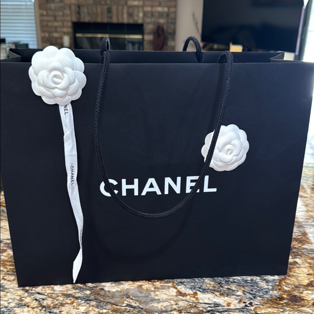 Authentic CHANEL Black and White Shopping Bag with Floral Accents & Ribbon